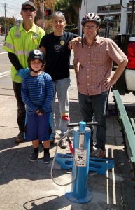 The intrepid installation team for Albany Strollers & Rollers' new public bike pump at the corner of Solano & Santa Fe. The City of Albany's Mark Matherly, AS&R's Amy Smolens & Dan Lieberman and Dan's son Sander